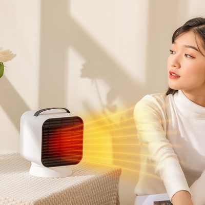 Φορητός ανεμιστήρας PTC Heater Desktop 1000W Μαύρος πυρίμαχος ABS για το σπίτι